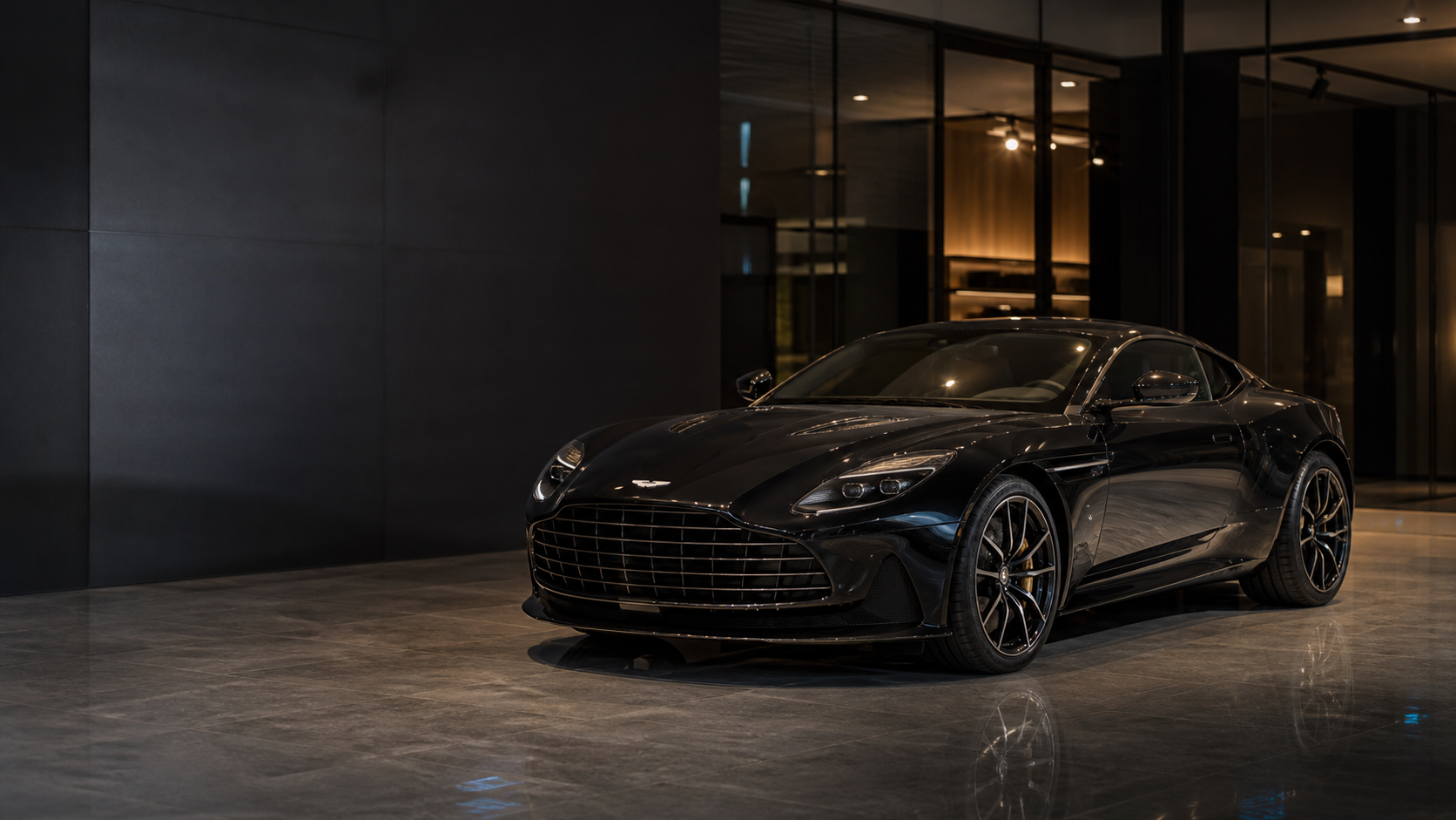 Black Aston Martin DB12 in a contemporary premium showroom